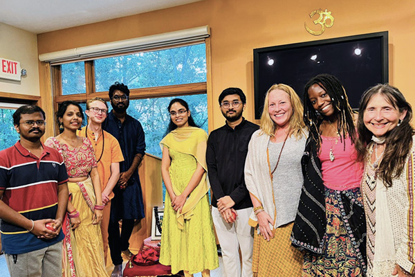 A group of devotees gathering in the main sanctum